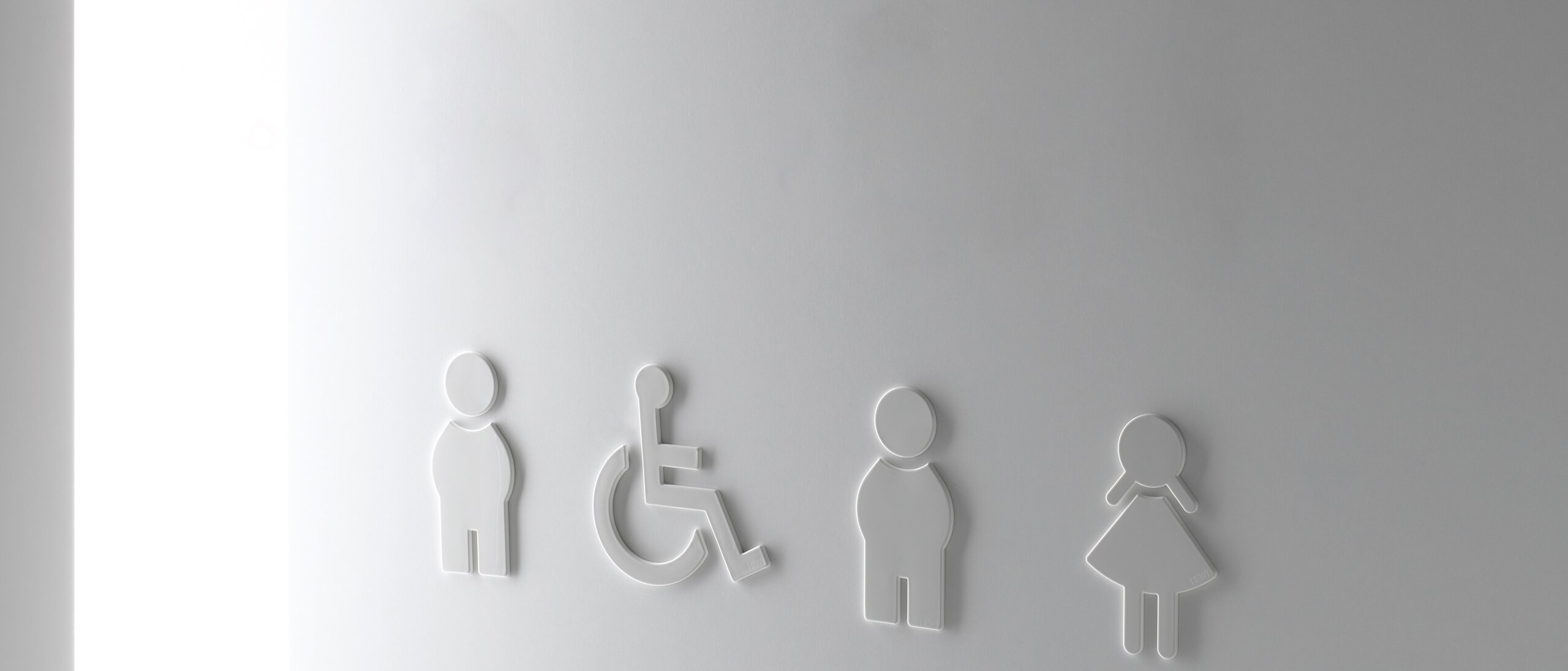 WC symbols man woman and barrier-free in the colour white made of polyamide